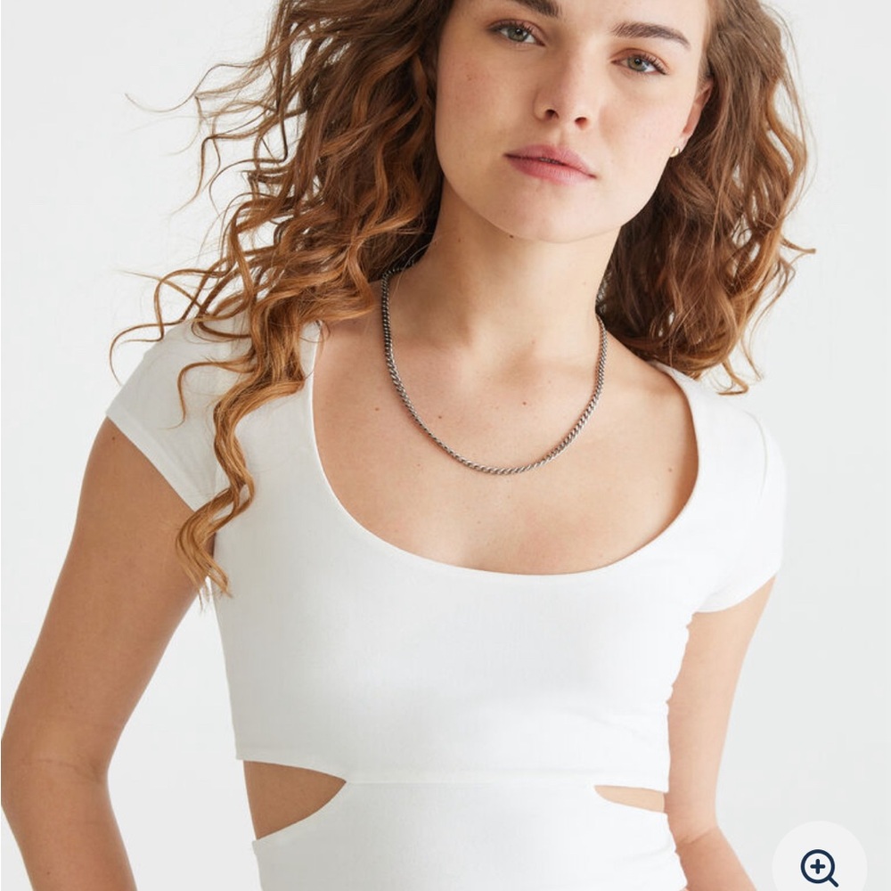 white cut out crop top.